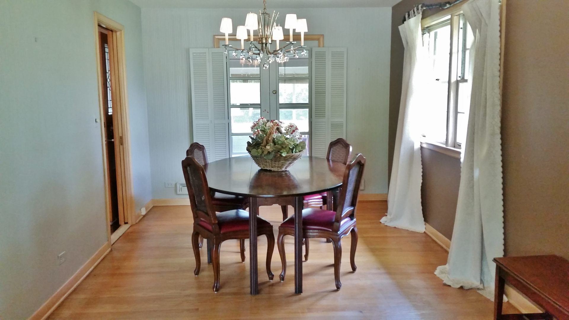 812 North Merrill Street Park Ridge, IL 60068 - Photo 14 of 30 a view of a dining room with furniture and chandelier