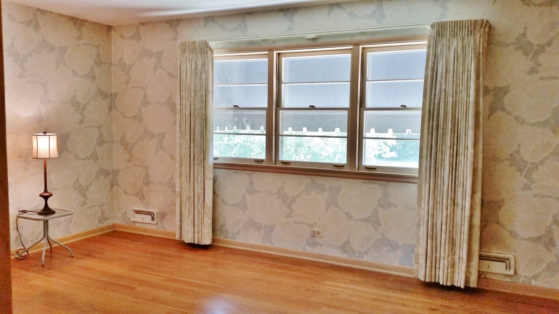 812 North Merrill Street Park Ridge, IL 60068 - Photo 18 of 30 a view of an empty room with wooden floor and a window