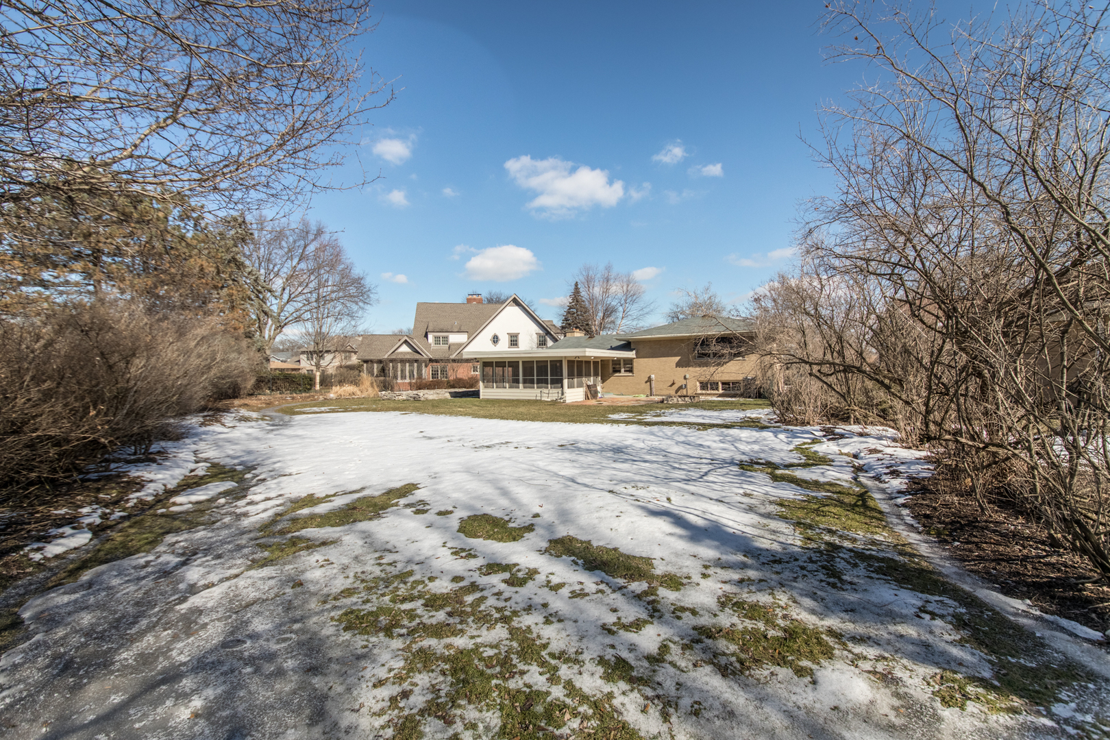 812 North Merrill Street Park Ridge, IL 60068 - Photo 3 of 30 a view of the house with snow on the road