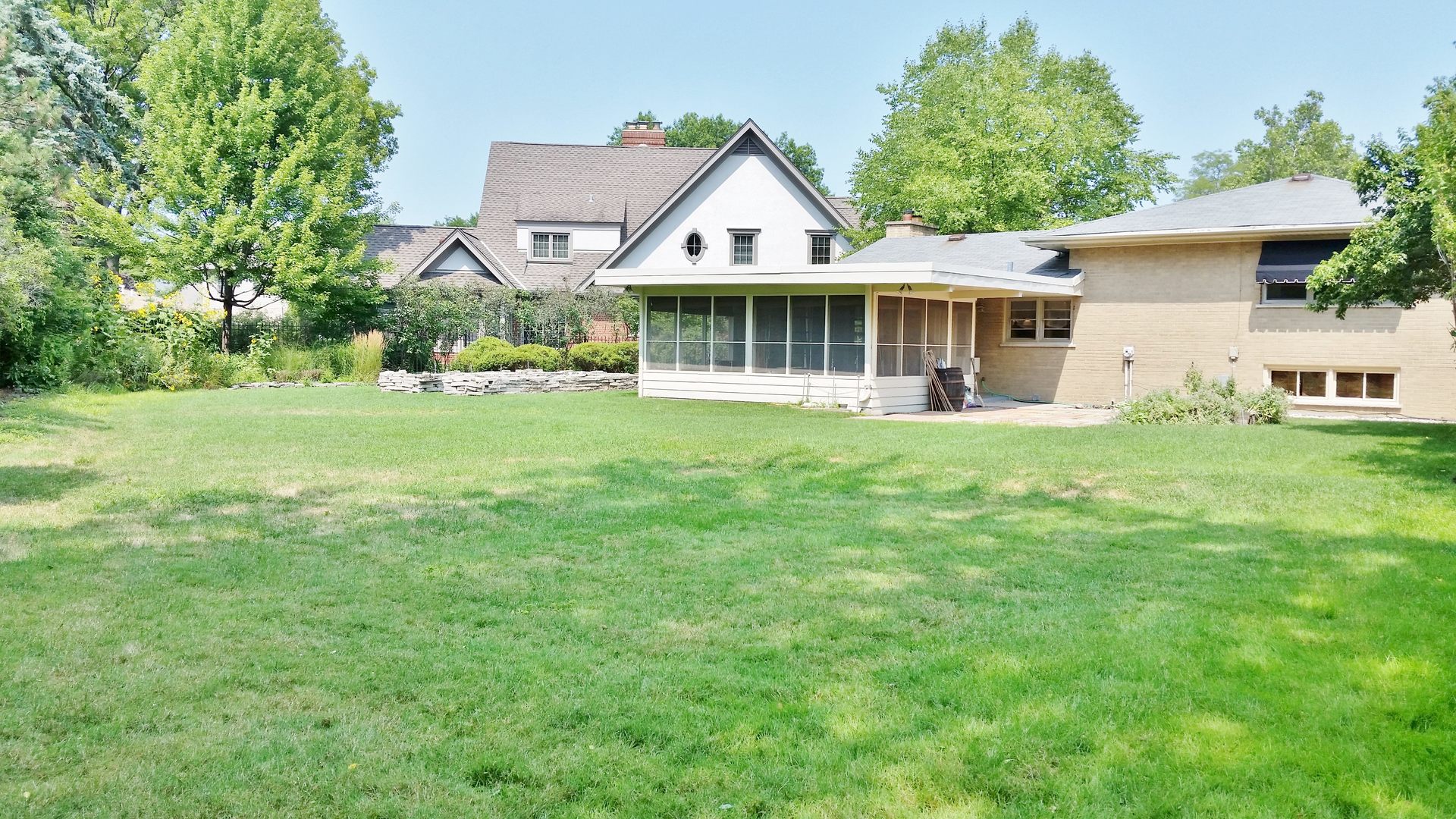 812 North Merrill Street Park Ridge, IL 60068 - Photo 25 of 30 a front view of a house with a garden and deck