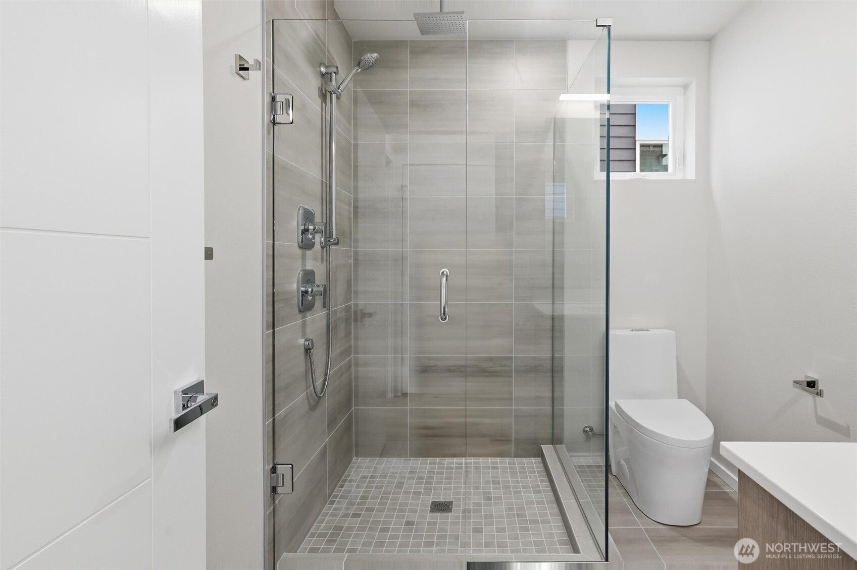 1816 24th Avenue South Seattle, WA 98144 - Photo 12 of 20 a bathroom with a shower and a toilet