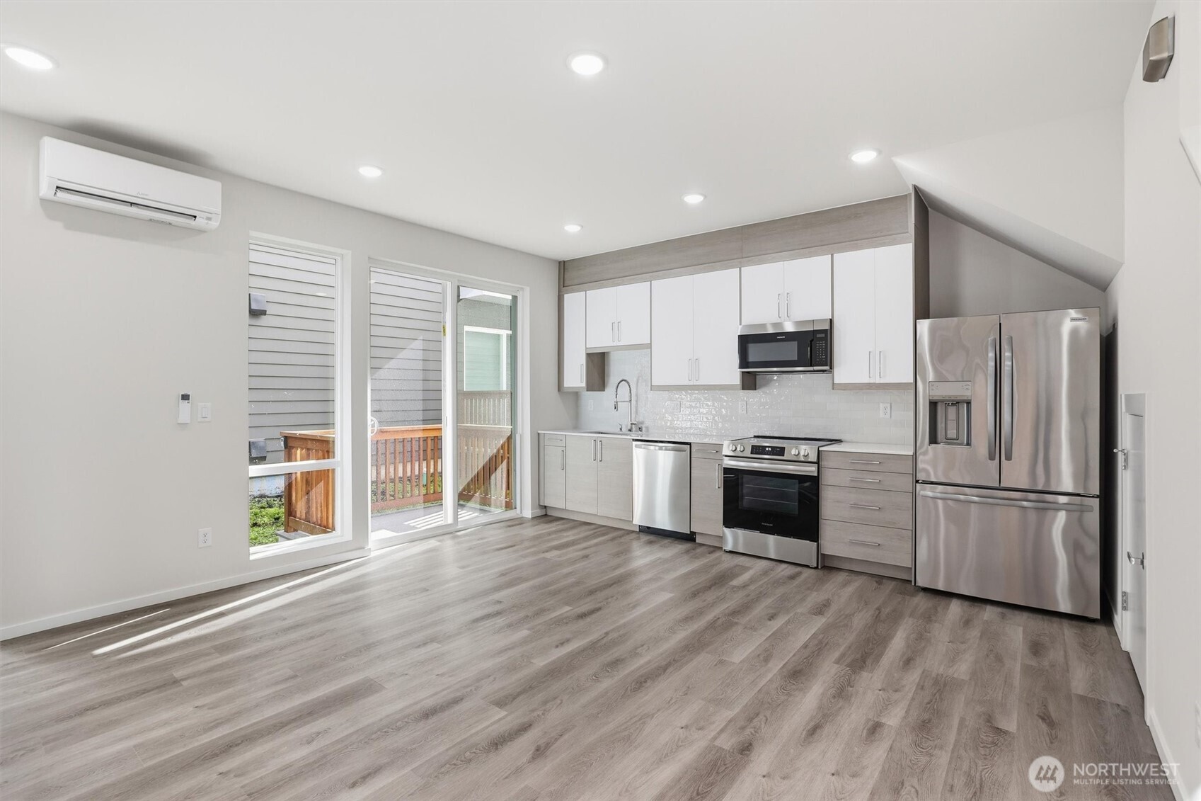 1816 24th Avenue South Seattle, WA 98144 - Photo 3 of 20 a kitchen with stainless steel appliances a refrigerator sink and microwave