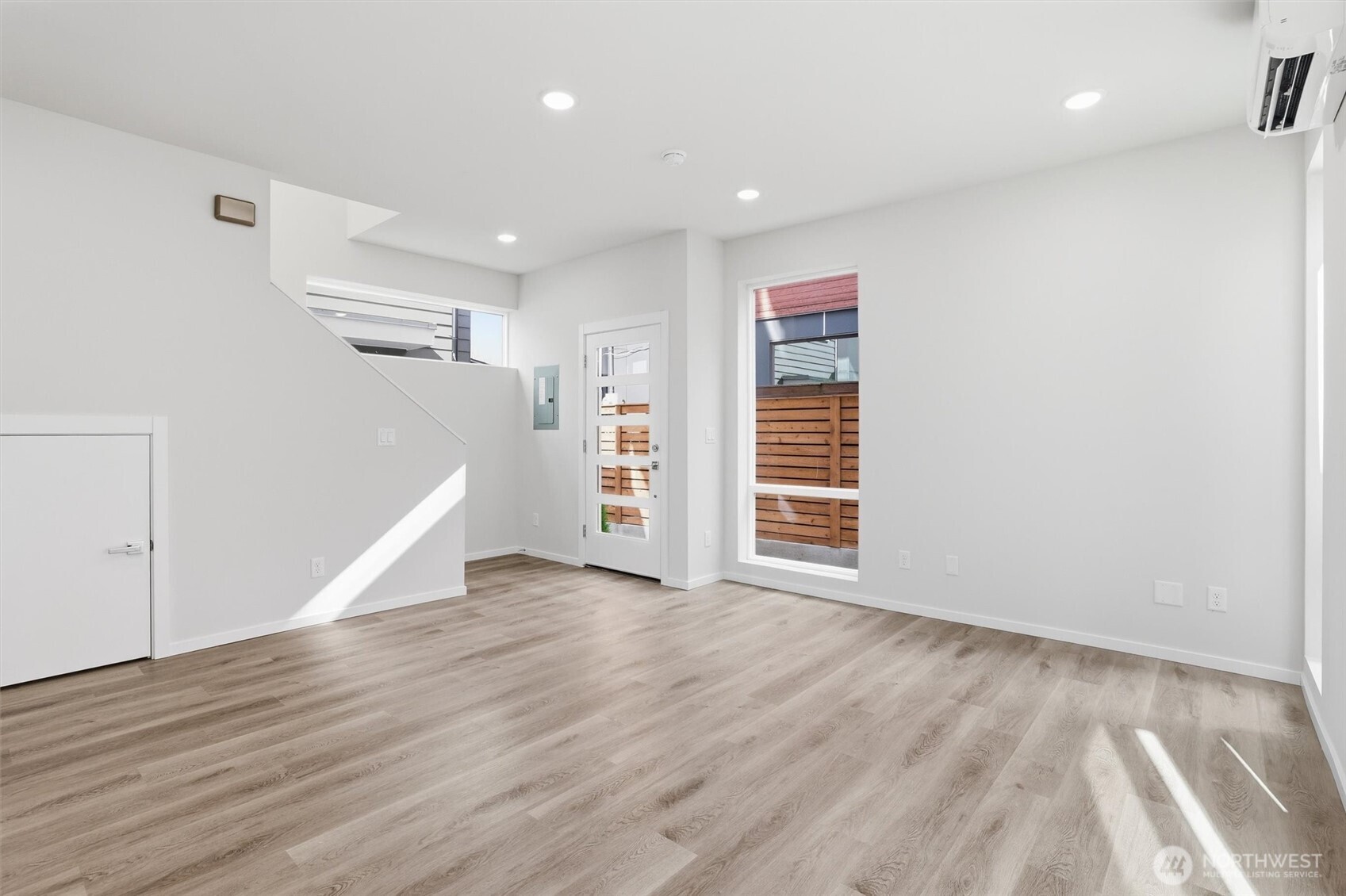 1816 24th Avenue South Seattle, WA 98144 - Photo 5 of 20 an empty room with wooden floor and closet