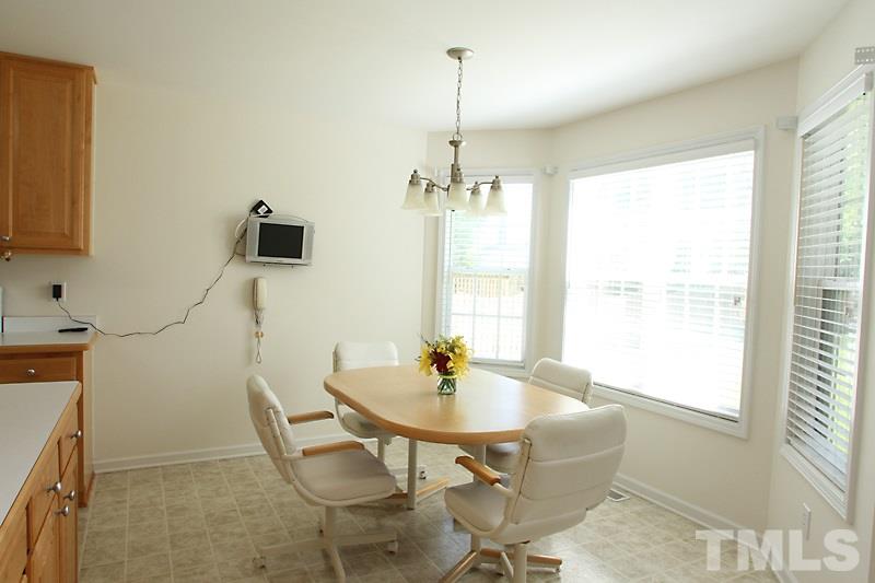 133 Mickleson Ridge Drive Raleigh, NC 27603 - Photo 4 of 18 a dining room with furniture and window