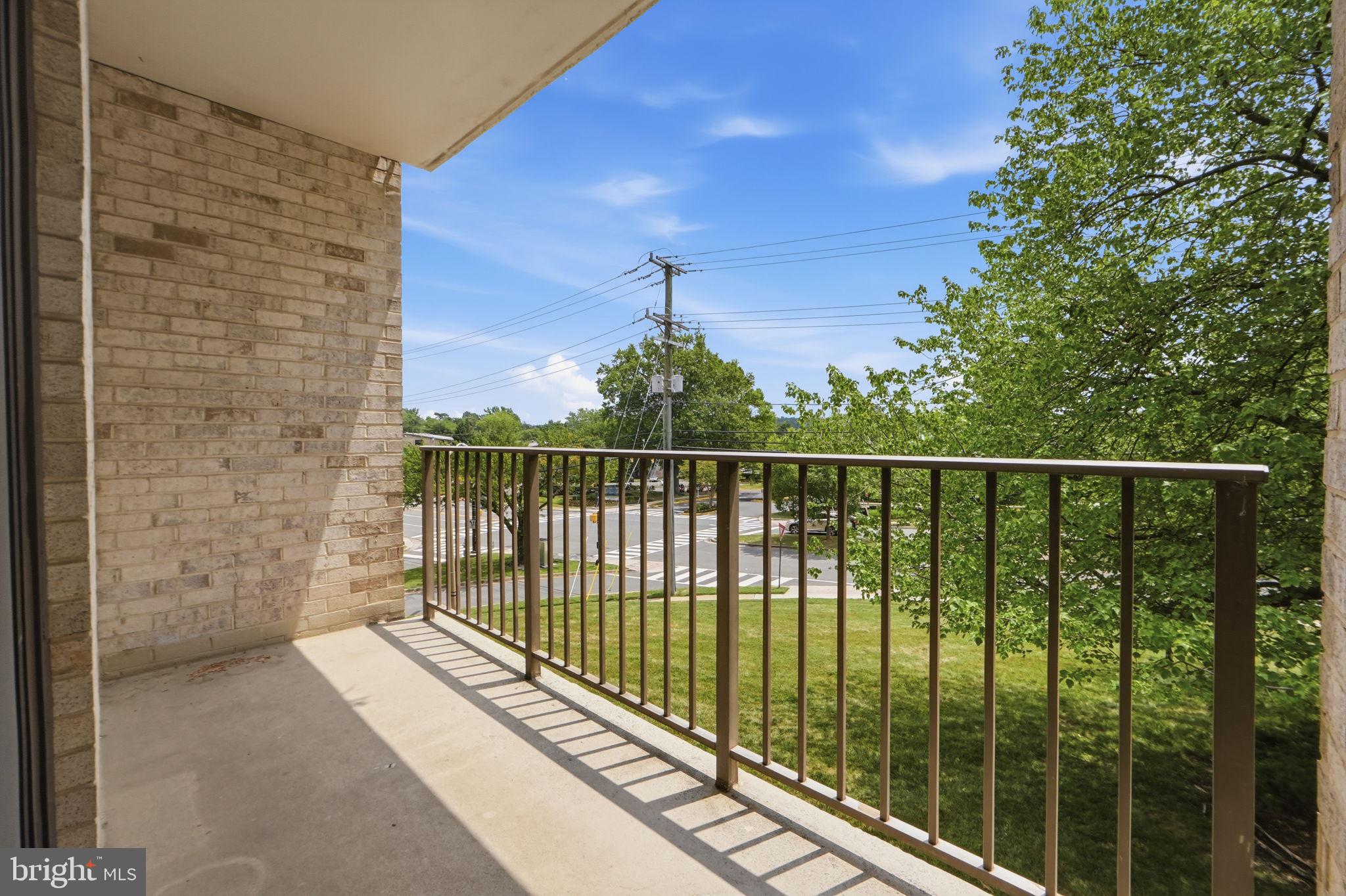 6141 Edsall Road, Unit E Alexandria, VA 22304 - Photo 7 of 16 Sunny balcony with green views.