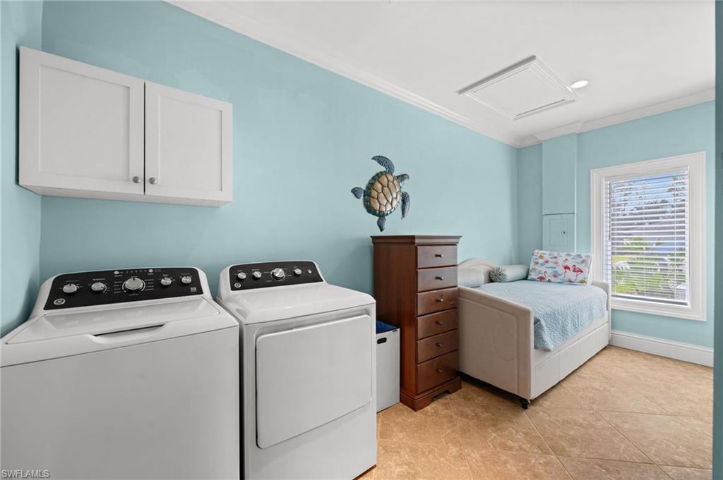 1963 Bethany Place Naples, FL 34109 - Photo 44 of 47 a utility room with dryer and washer