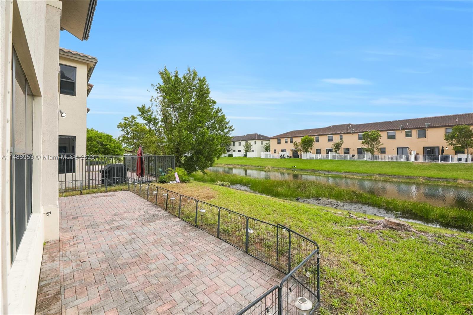 3308 West 95th Terrace Hialeah, FL 33018 - Photo 33 of 43 a view of swimming pool from a balcony