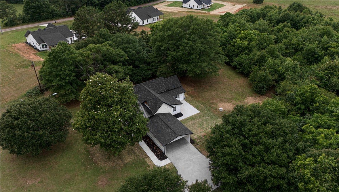 2817 Broadway Lake Road Anderson, SC 29621 - Photo 33 of 41 New construction home surrounded by lush, mature trees for a secluded setting.