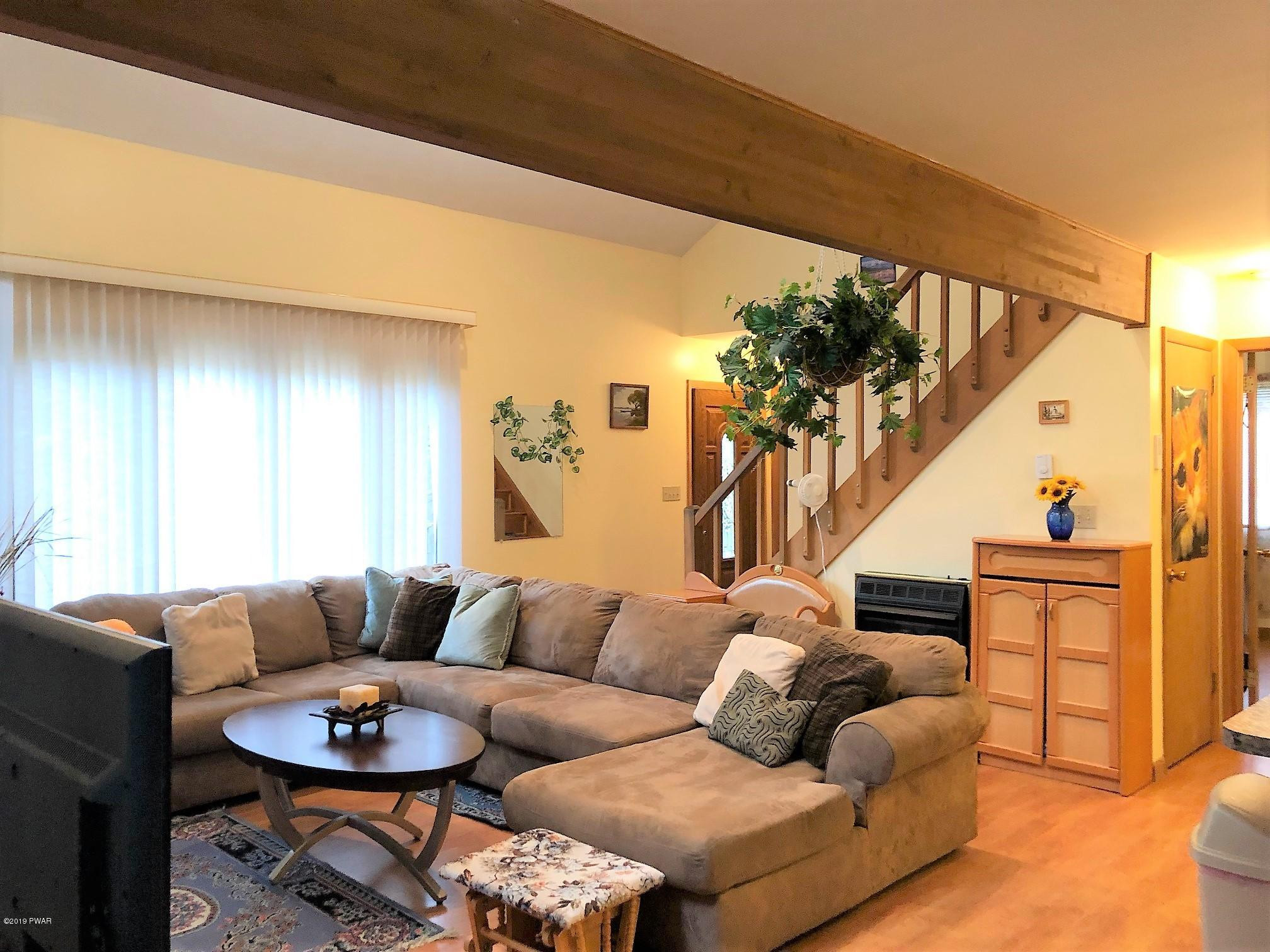 3039 Northgate Road Lake Ariel, PA 18436 - Photo 9 of 57 a living room with furniture and a wooden floor