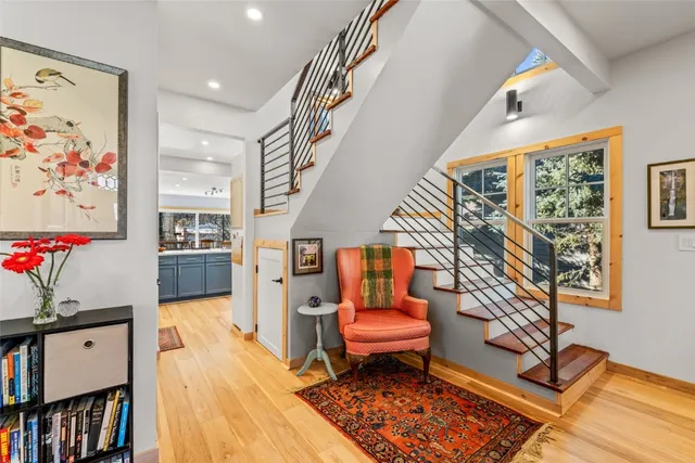 a living room with furniture and a rug