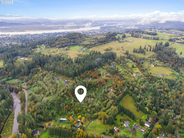 a view of a city with mountains in the background