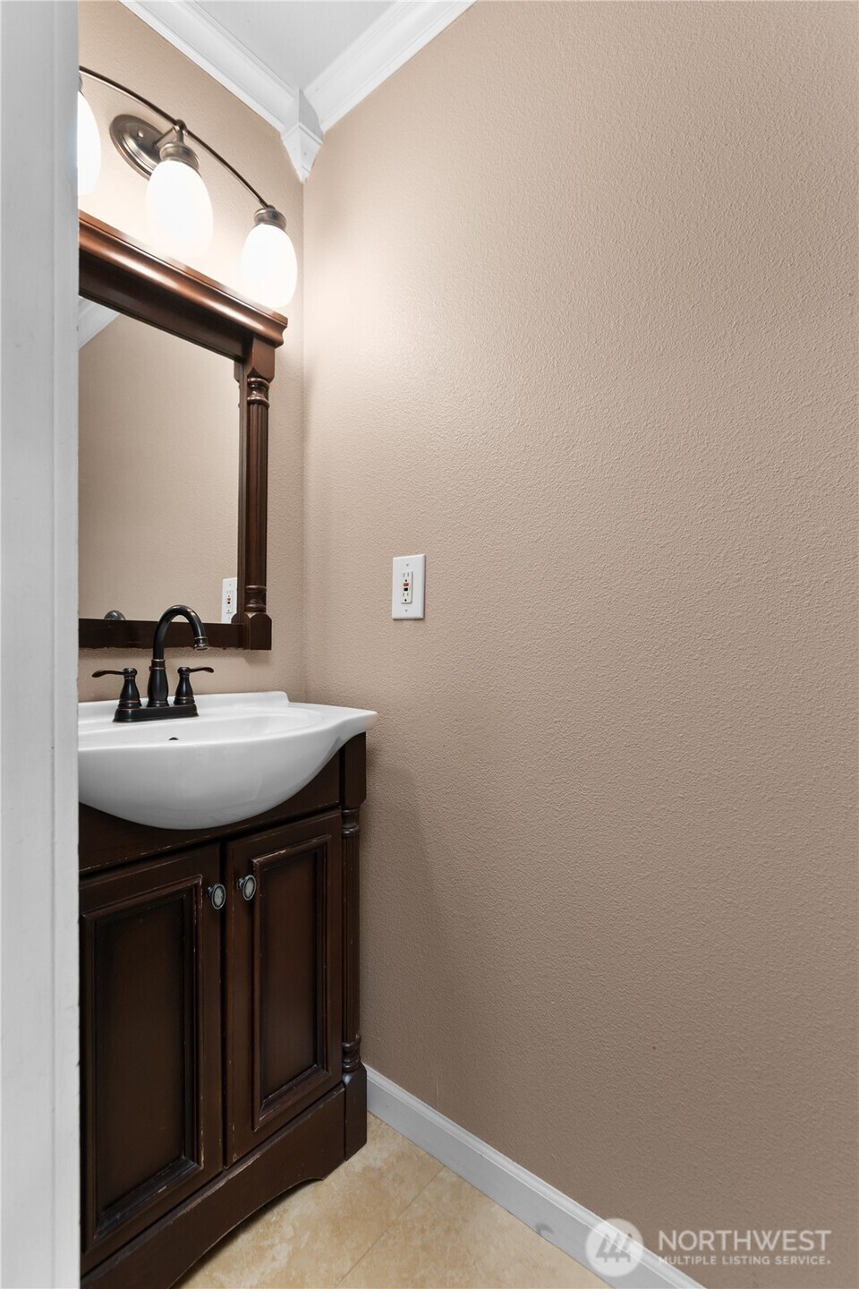 427 Klinger Street Sedro-Woolley, WA 98284 - Photo 12 of 25 a bathroom with a sink and a mirror