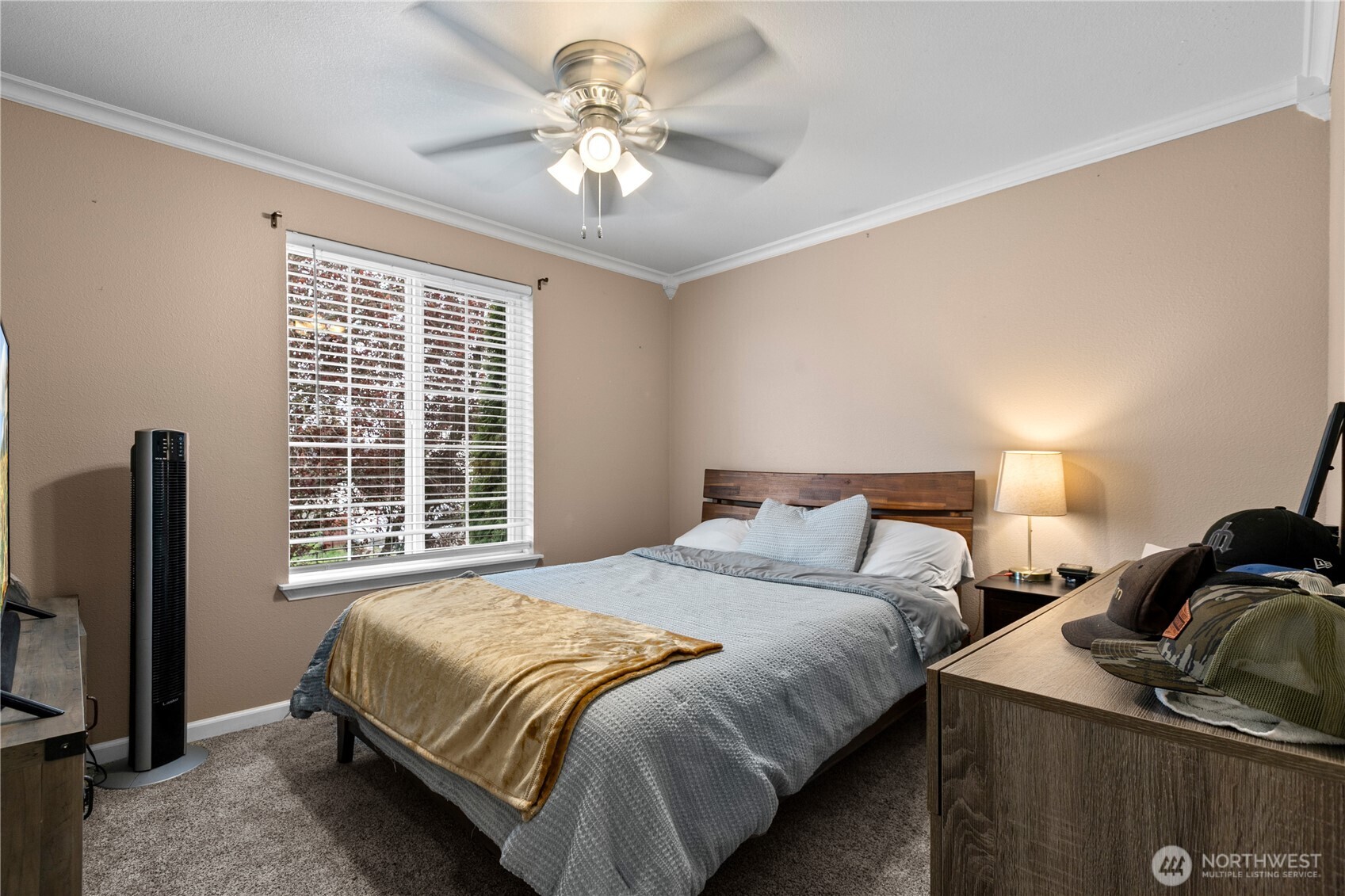 427 Klinger Street Sedro-Woolley, WA 98284 - Photo 20 of 25 a bedroom with a bed and a flat tv screen on a dresser
