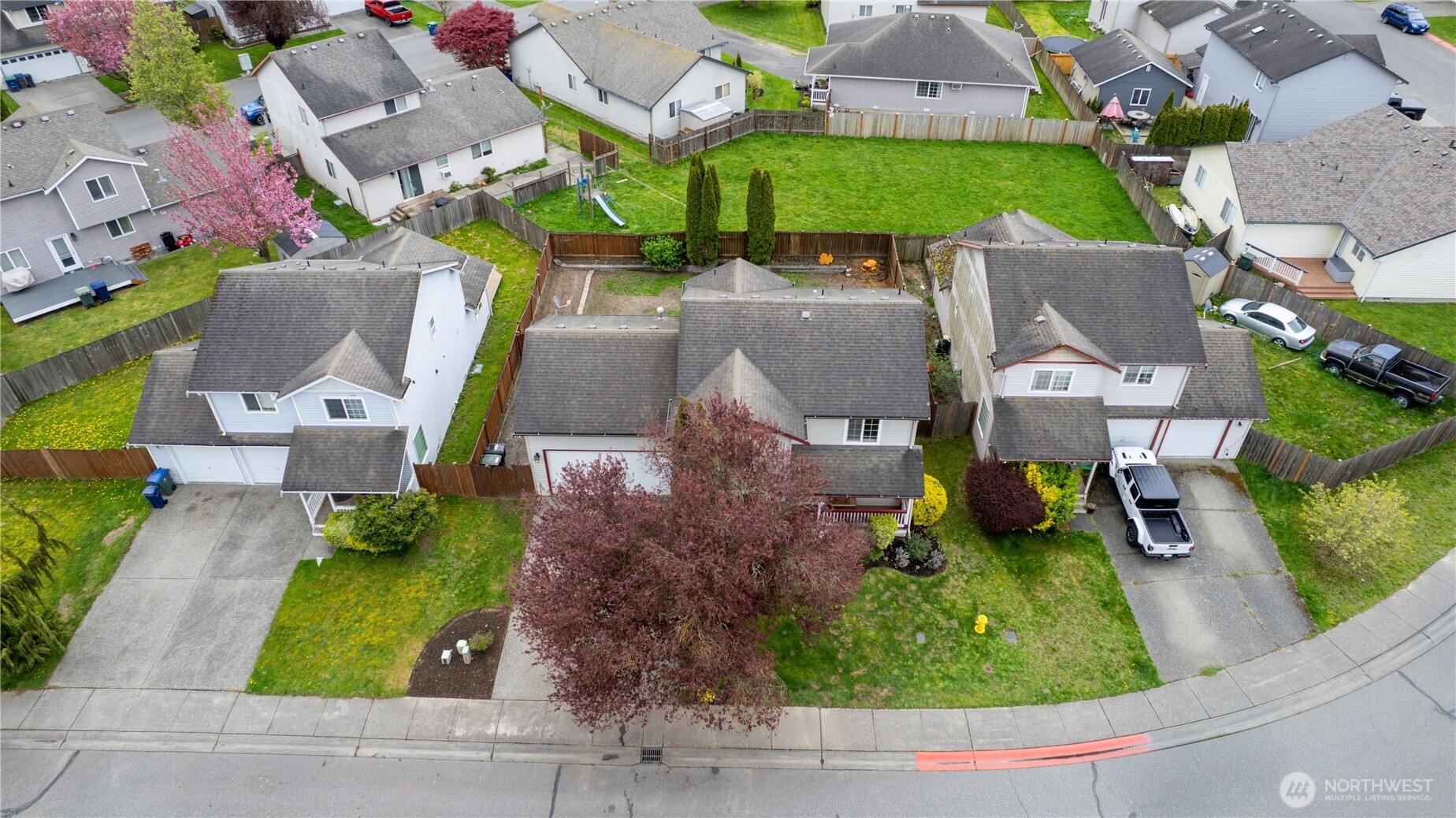 427 Klinger Street Sedro-Woolley, WA 98284 - Photo 22 of 25 an aerial view of a house with garden space and street view