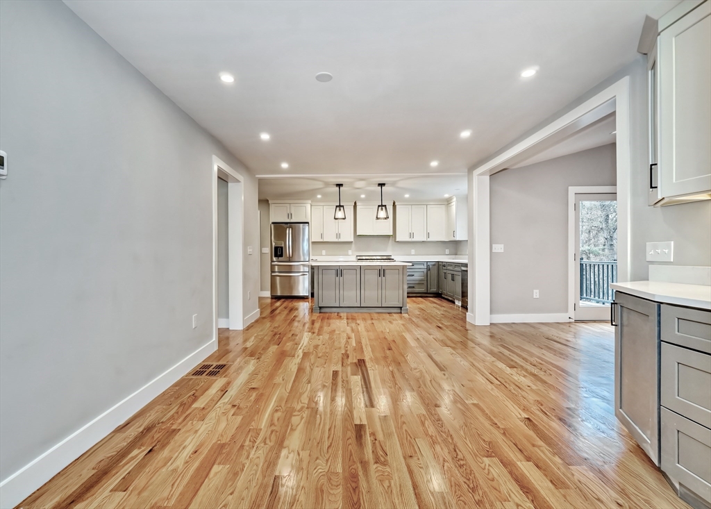 111 Cedar Street Lexington, MA 02421 - Photo 12 of 40 a view of kitchen with wooden floor and electronic appliances