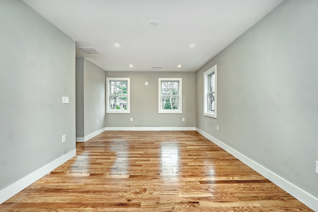 111 Cedar Street Lexington, MA 02421 - Photo 17 of 40 a view of an empty room and window