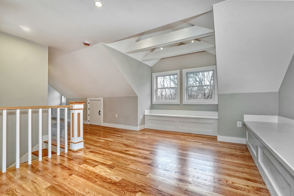 111 Cedar Street Lexington, MA 02421 - Photo 26 of 40 a view of empty room with wooden floor and fan