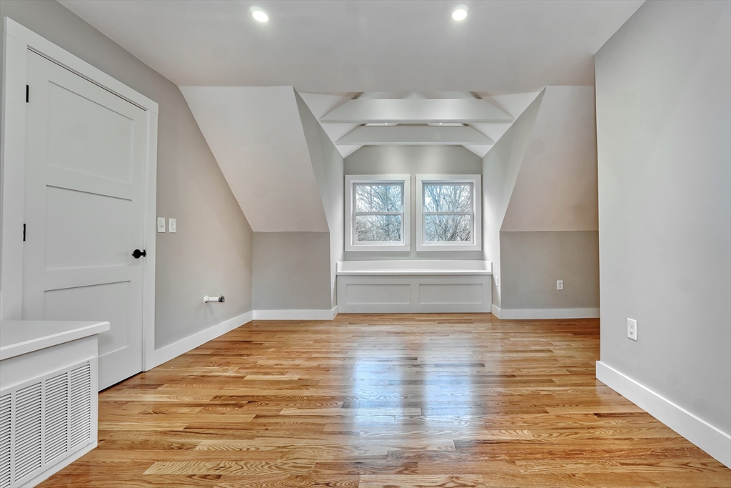 111 Cedar Street Lexington, MA 02421 - Photo 27 of 40 a view of an empty room and window
