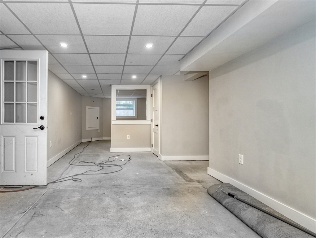 111 Cedar Street Lexington, MA 02421 - Photo 32 of 40 a view of an empty room with a window