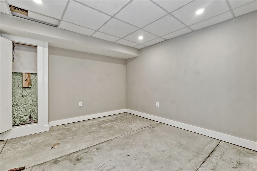 111 Cedar Street Lexington, MA 02421 - Photo 33 of 40 an empty room with windows