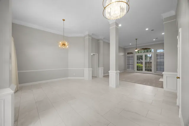 a view of an empty room and window