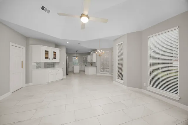 a view of kitchen with furniture and window