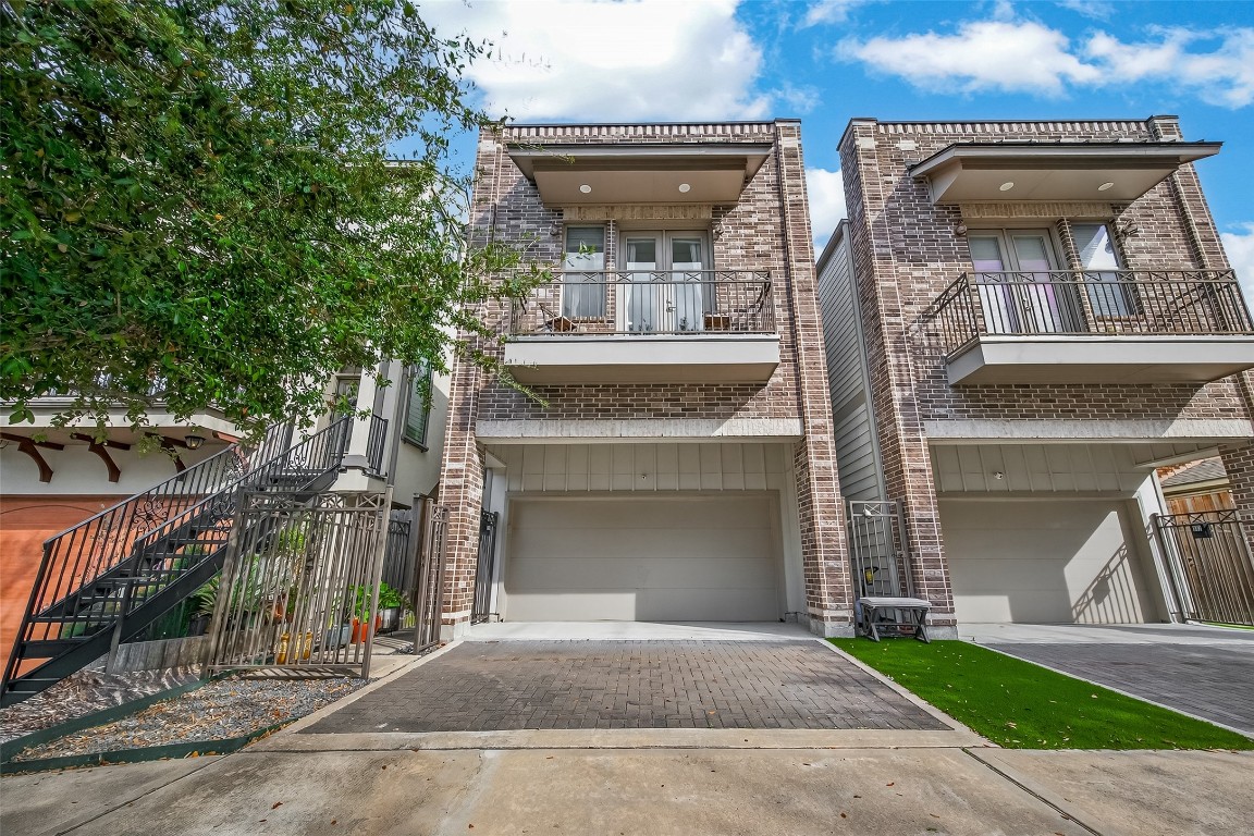 a front view of a house with a garage