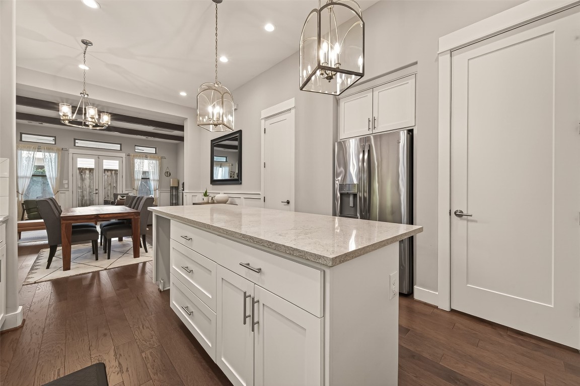 604 West Pierce Street Houston, TX 77019 - Photo 13 of 33 a view of a kitchen center island cabinets and wooden floor