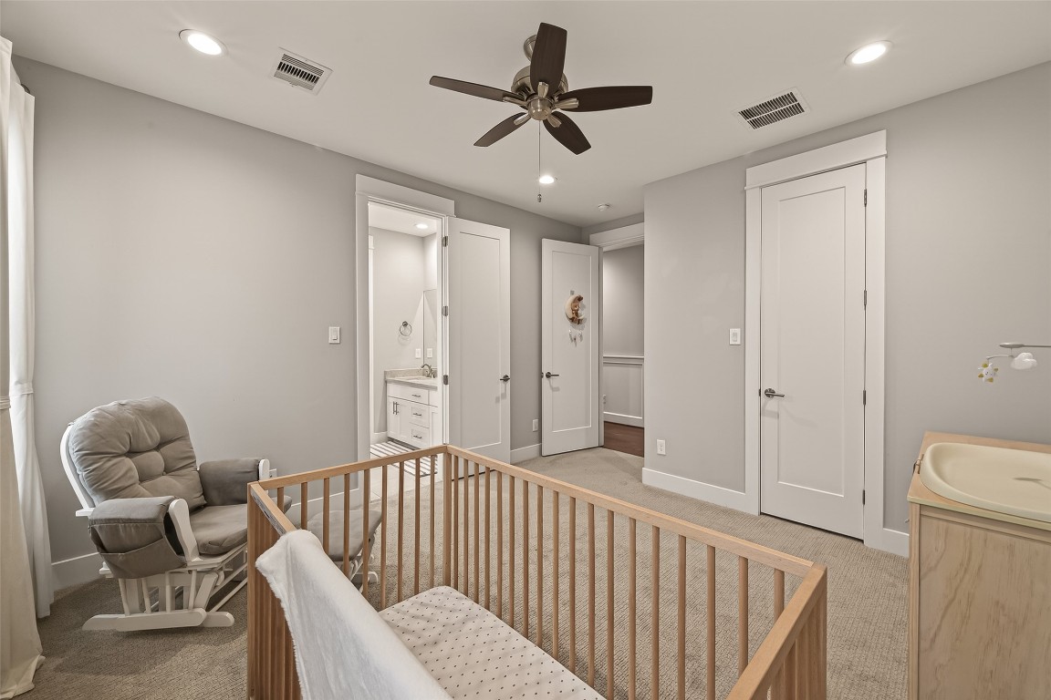 604 West Pierce Street Houston, TX 77019 - Photo 21 of 33 a bedroom with furniture and a window