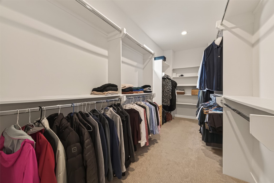604 West Pierce Street Houston, TX 77019 - Photo 29 of 33 a view of walk in closet with clothes and shoes