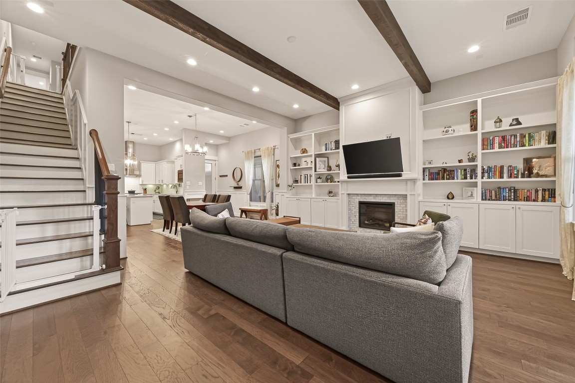 604 West Pierce Street Houston, TX 77019 - Photo 7 of 33 a living room with furniture a flat screen tv and a fireplace