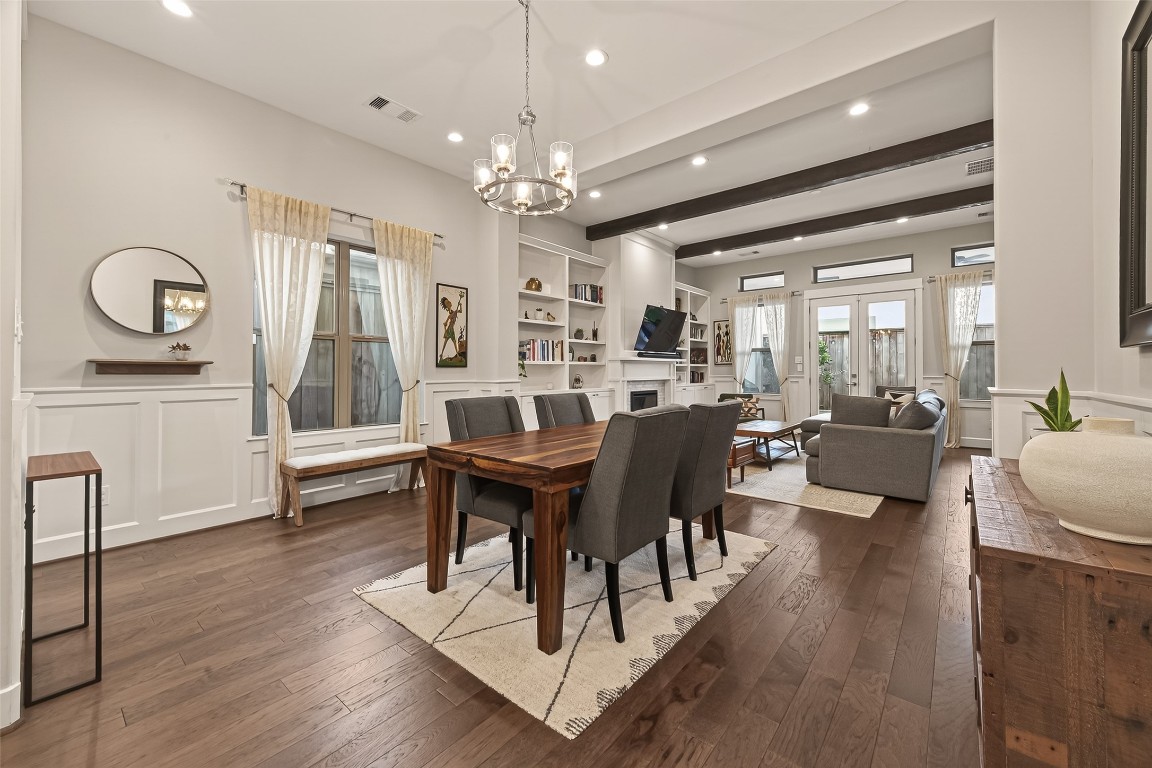 604 West Pierce Street Houston, TX 77019 - Photo 10 of 33 a view of a dining room with furniture window and wooden floor