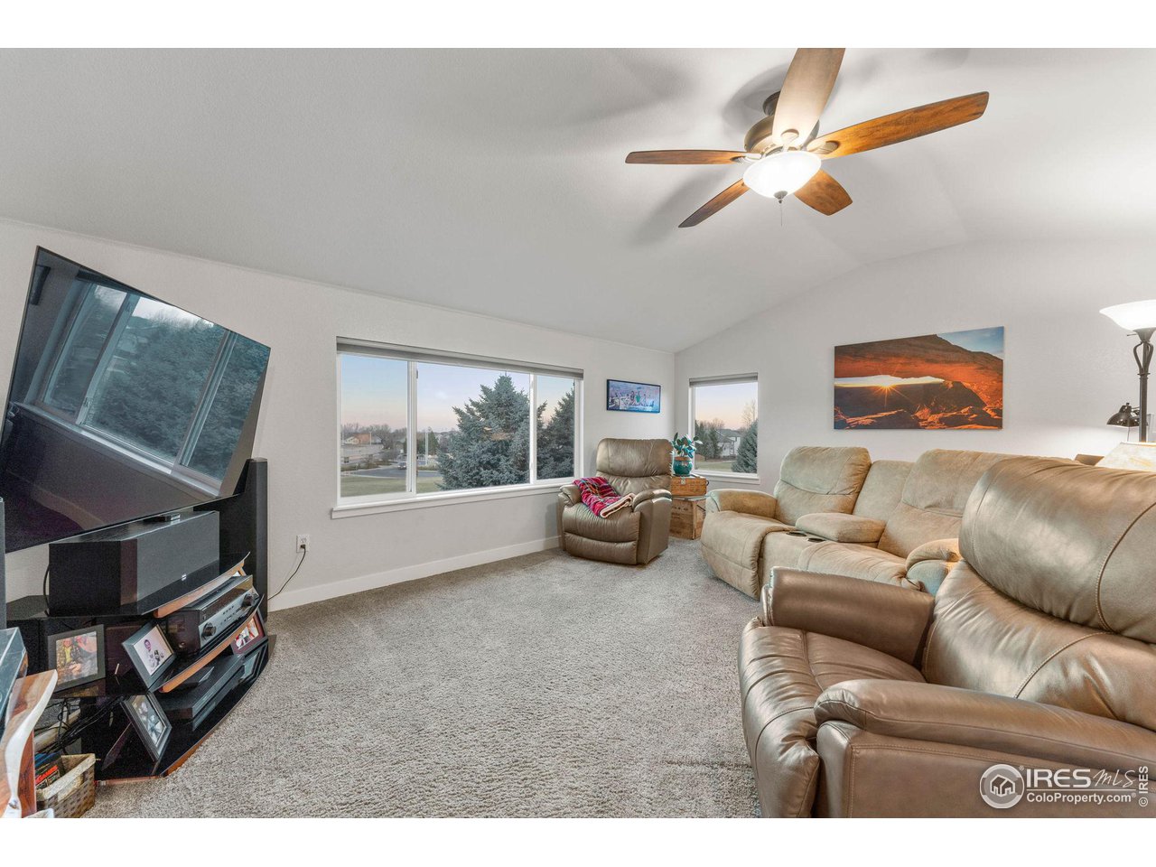 6607 Echo Circle Firestone, CO 80504 - Photo 14 of 40 a living room with furniture and a window