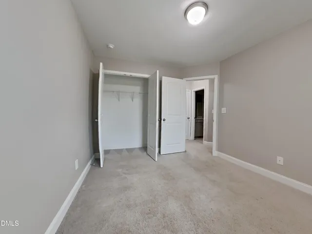 a bathroom with a shower and toilet