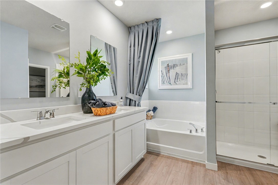793 George Street Sebastian, FL 32958 - Photo 20 of 22 a bathroom with a bathtub sink and mirror
