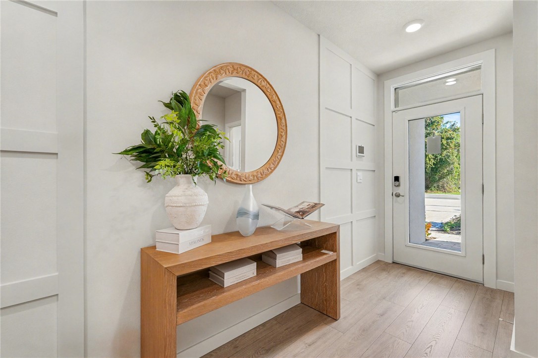 793 George Street Sebastian, FL 32958 - Photo 2 of 22 a room with painting on the wall and a potted plant