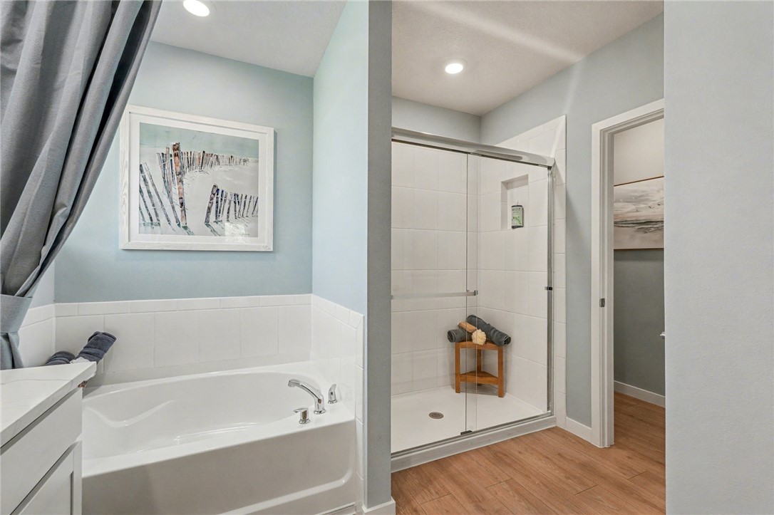 793 George Street Sebastian, FL 32958 - Photo 21 of 22 a bathroom with a bathtub and a shower