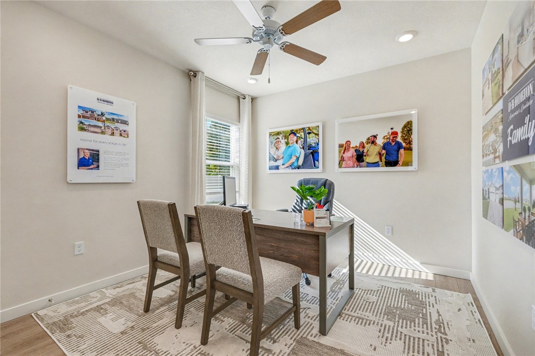 793 George Street Sebastian, FL 32958 - Photo 5 of 22 a view of a dining room with furniture and a chandelier fan