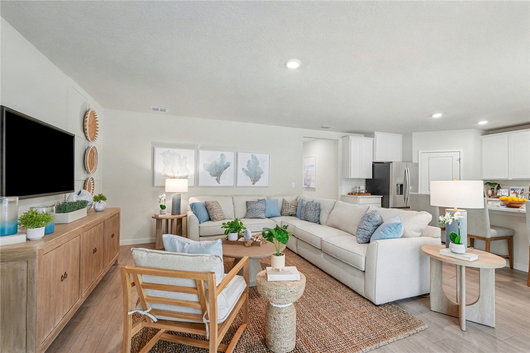 793 George Street Sebastian, FL 32958 - Photo 7 of 22 a living room with furniture and a flat screen tv