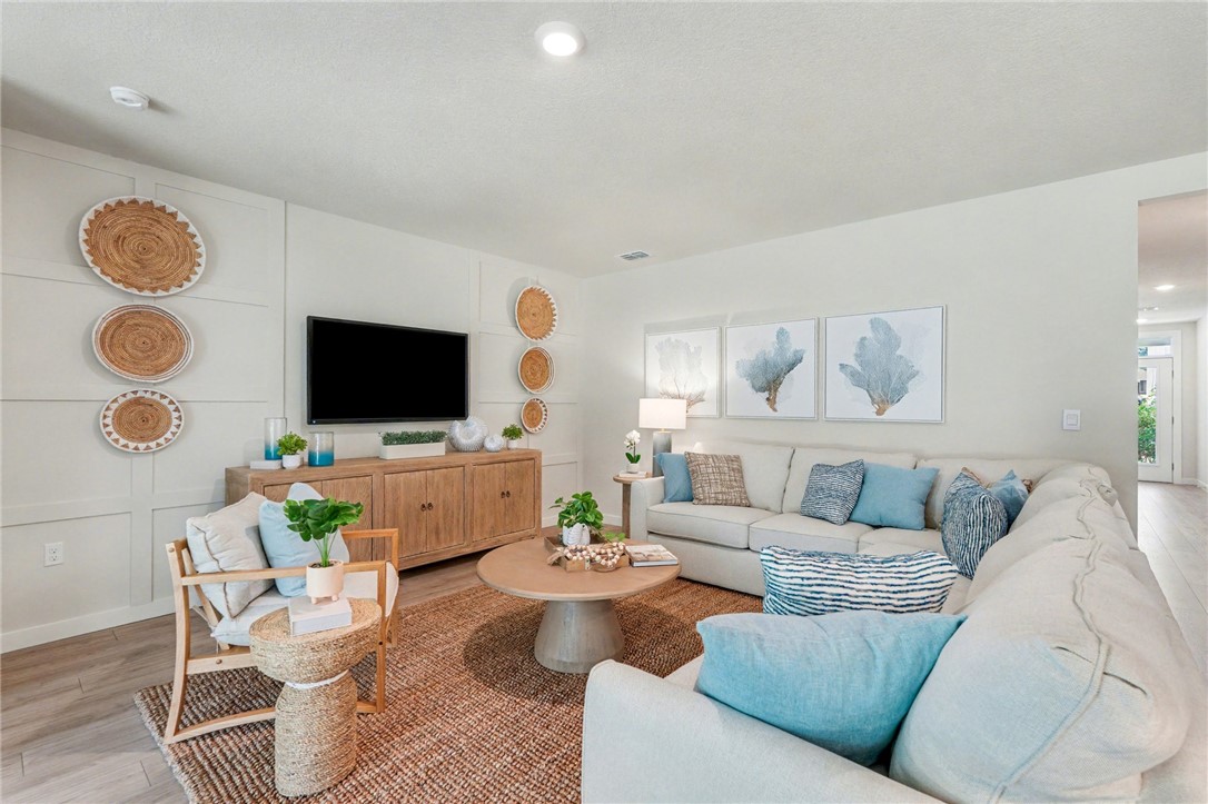 793 George Street Sebastian, FL 32958 - Photo 8 of 22 a living room with furniture and a flat screen tv