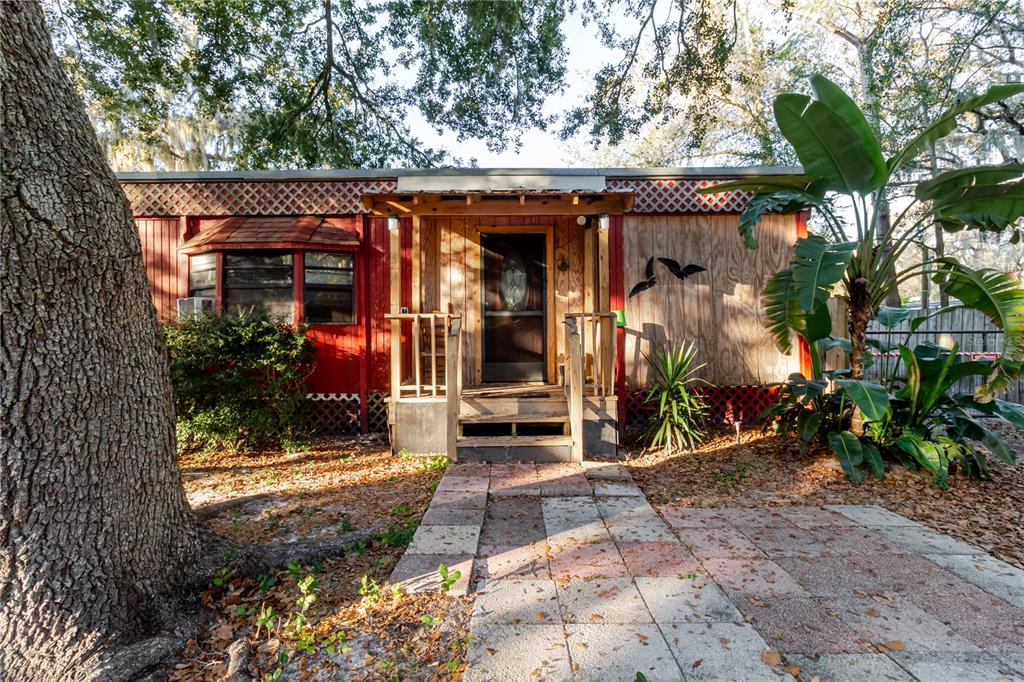 12104 Anderson Drive Riverview, FL 33579 - Photo 2 of 73 a view of a car park in front of a house