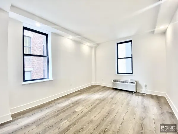 an empty room with windows