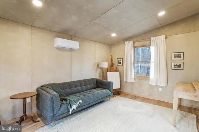 a outdoor space with patio furniture and a fireplace