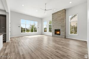 496 North Farmhouse Way, Unit 11 Midway, UT 84049 - Photo 15 of 50 Spacious living area featuring high ceilings, recessed lighting, and wood-finish flooring