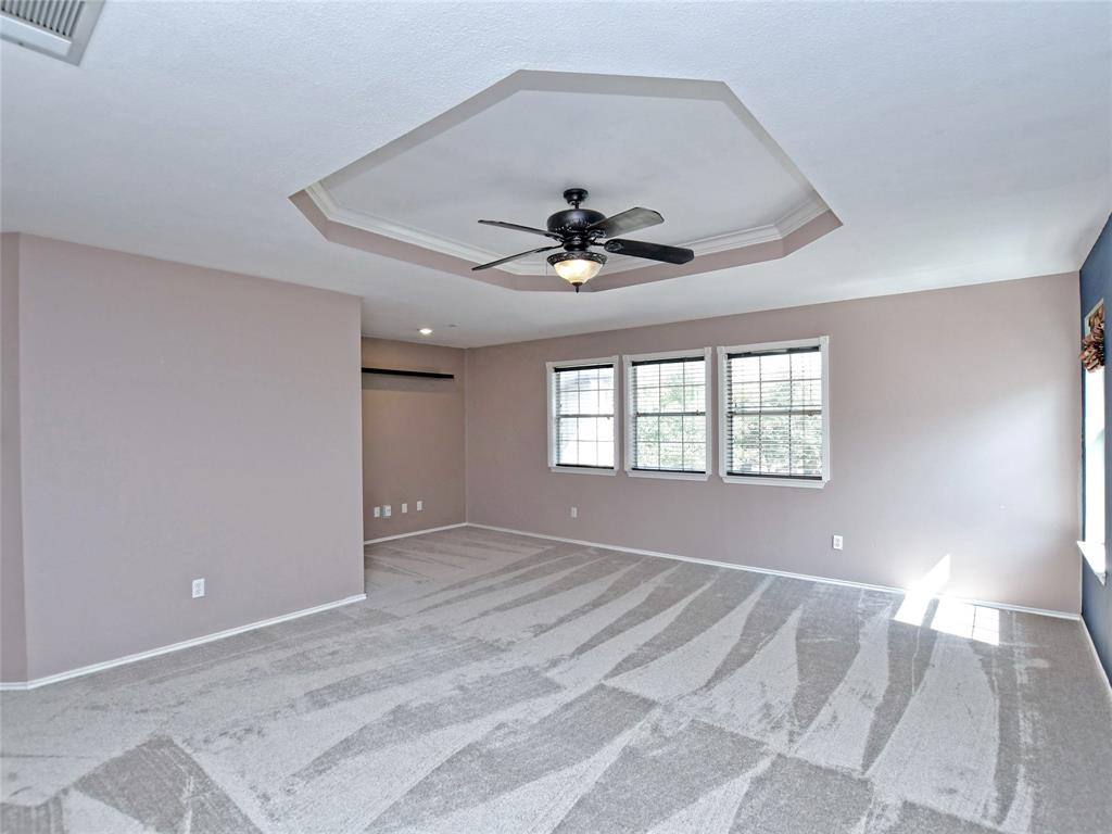 3031 Bent Tree Loop Round Rock, TX 78681 - Photo 4 of 28 The primary bedroom has a tray ceiling