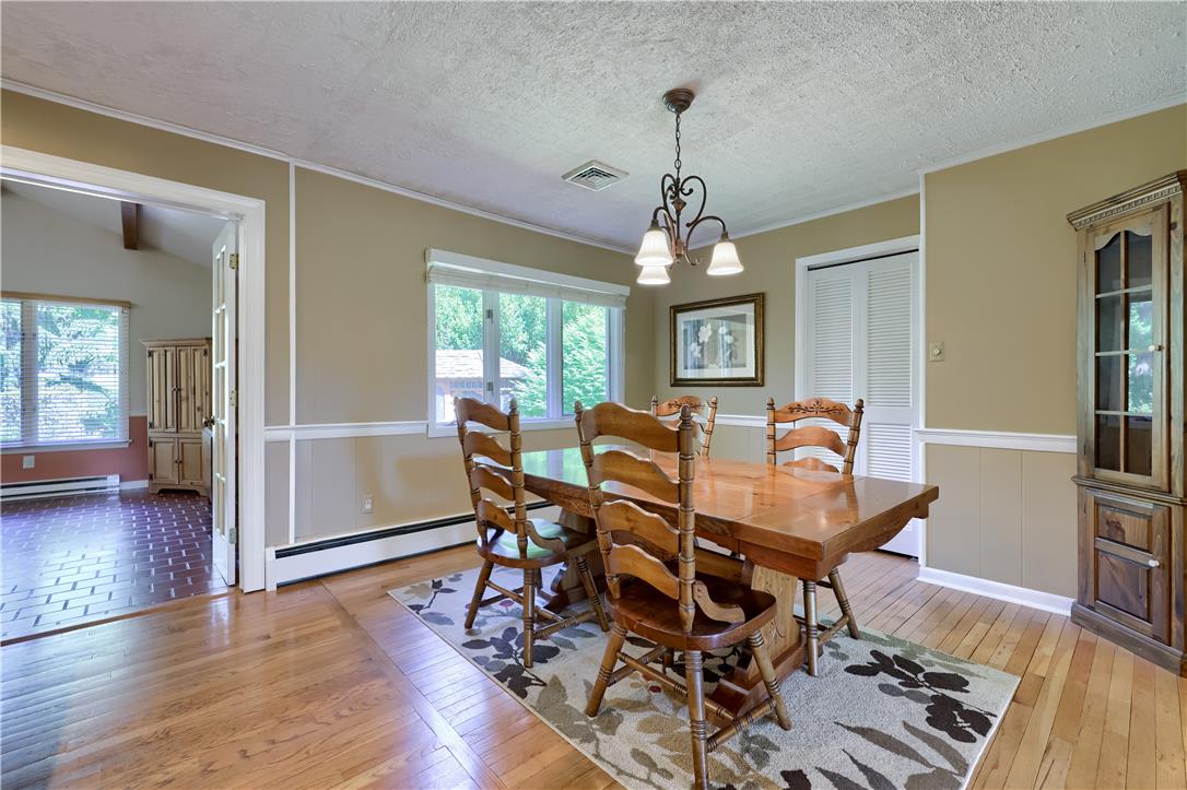 Coldsprings Rd Union Pottstown, PA 19465 - Photo 48 of 71 Hardwood floors and generous natural light define this inviting dining area.