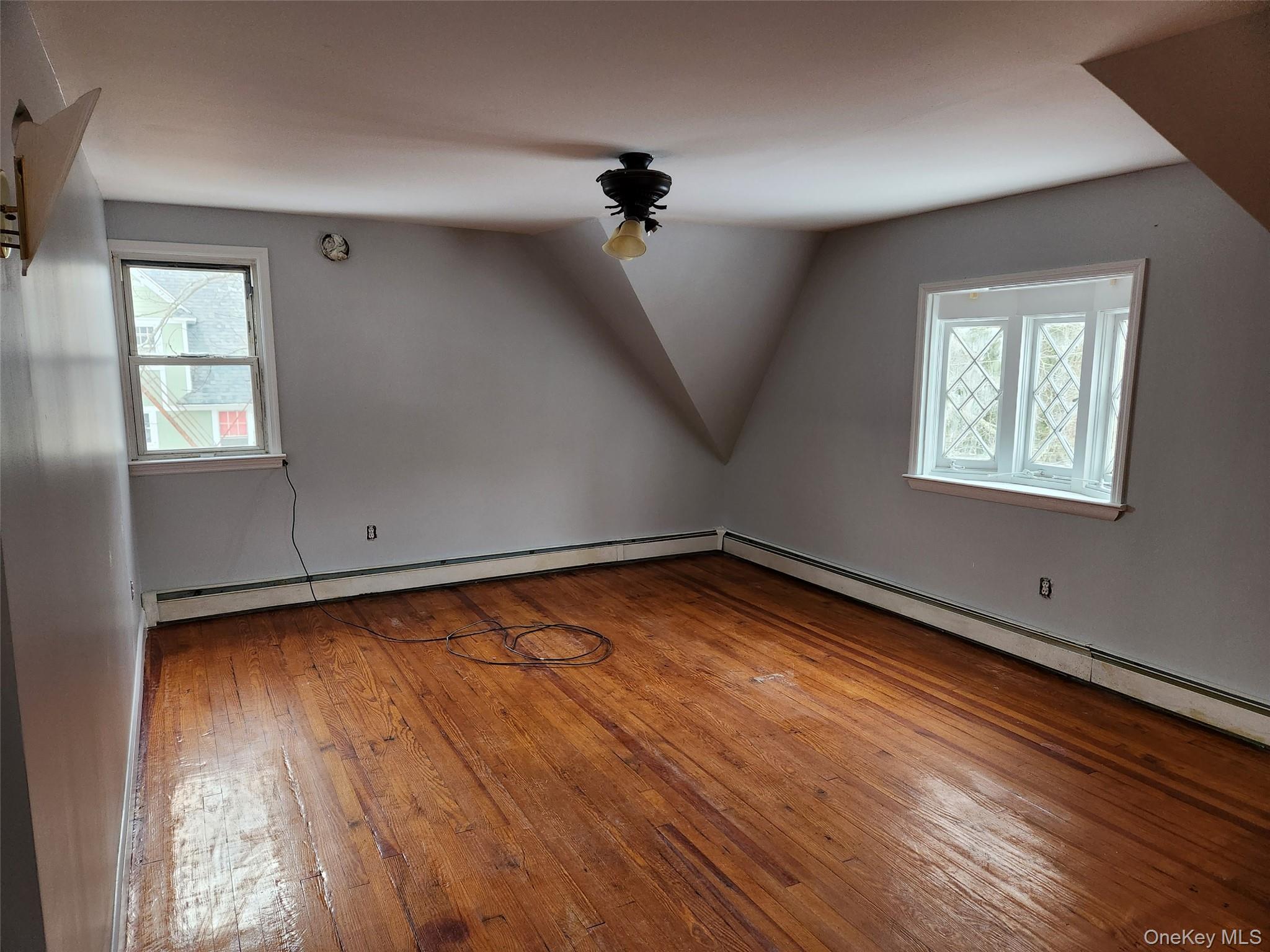 72 Stanton Corner Road, Unit 2 Swan Lake, NY 12783 - Photo 2 of 7 a view of a room with wooden floor and cabinet