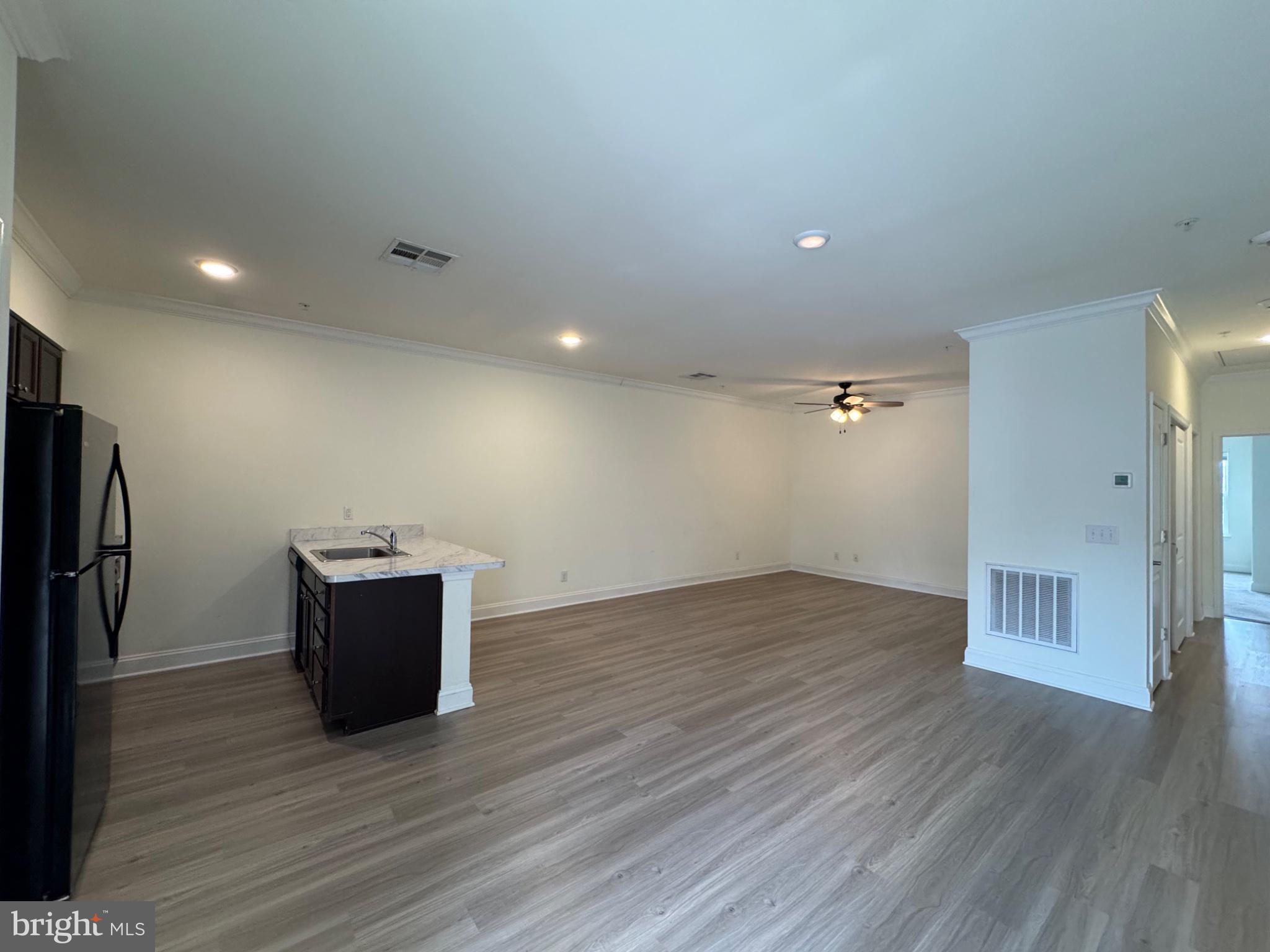 1812 Main Street, Unit 202 Chester, MD 21619 - Photo 23 of 32 a view of empty room with wooden floor