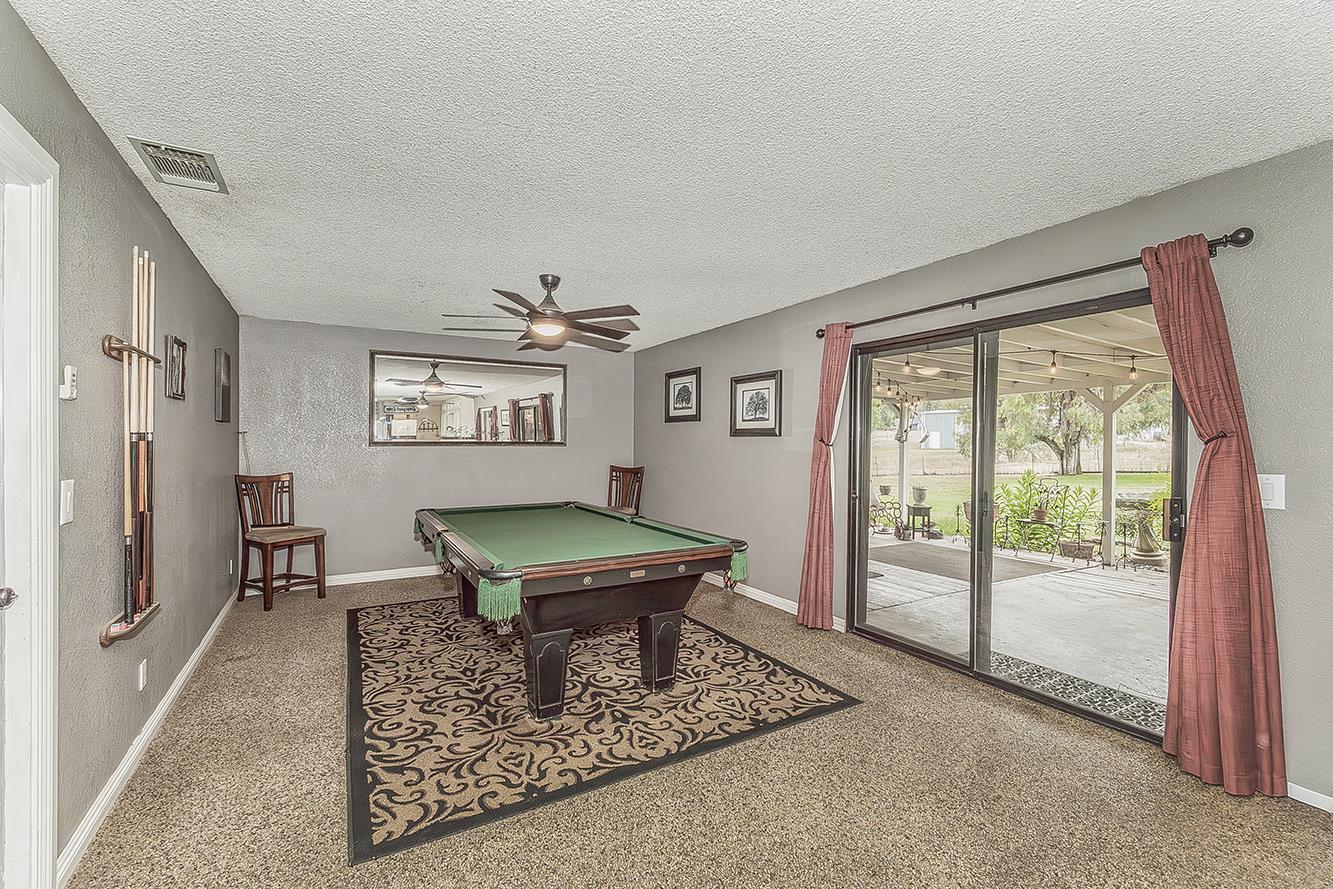 29545 Oak Meadow Road Tollhouse, CA 93667 - Photo 19 of 69 a living room with furniture a window and a table