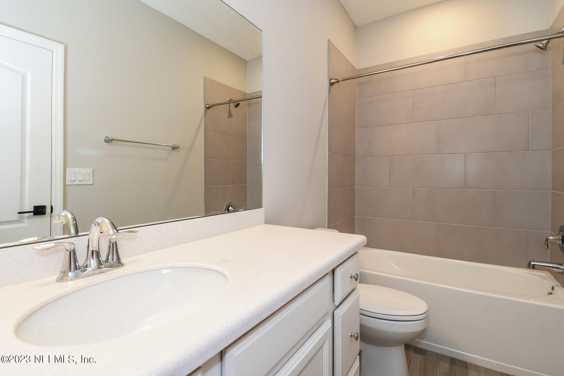 58 Martello Drive St. Augustine, FL 32092 - Photo 20 of 26 a bathroom with a sink a toilet and a bathtub